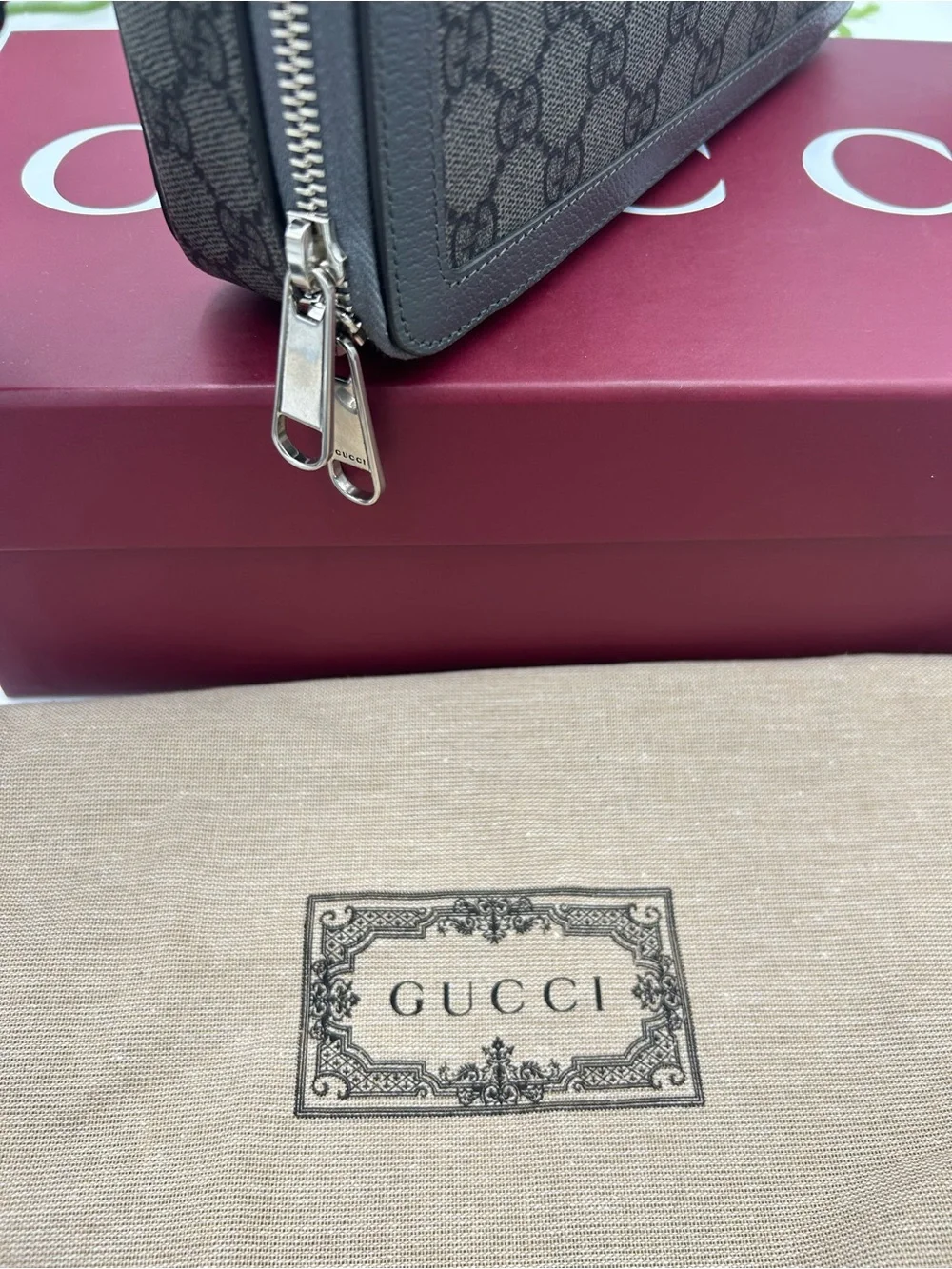 Men's Gucci GG Supreme shoulder Bag crafted in gray and black canvas made Italy